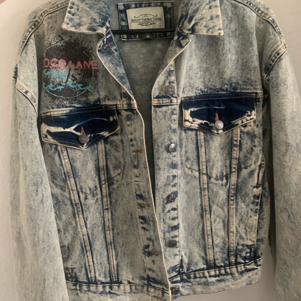 Denim jacket with painted details.